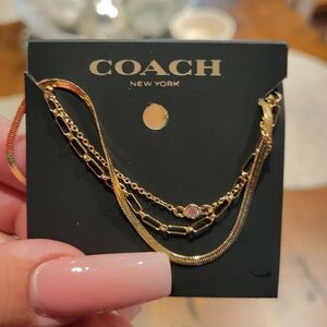 New coach necklaces
